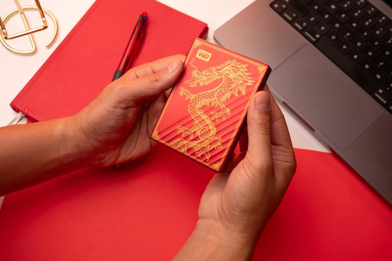 imageWD 4TB My Passport Ultra Blue Portable External Hard Drive backup software with defense against ransomware and password protection USBC and USB 31 WDBFTM0040BBLWESNLimited Edition Red